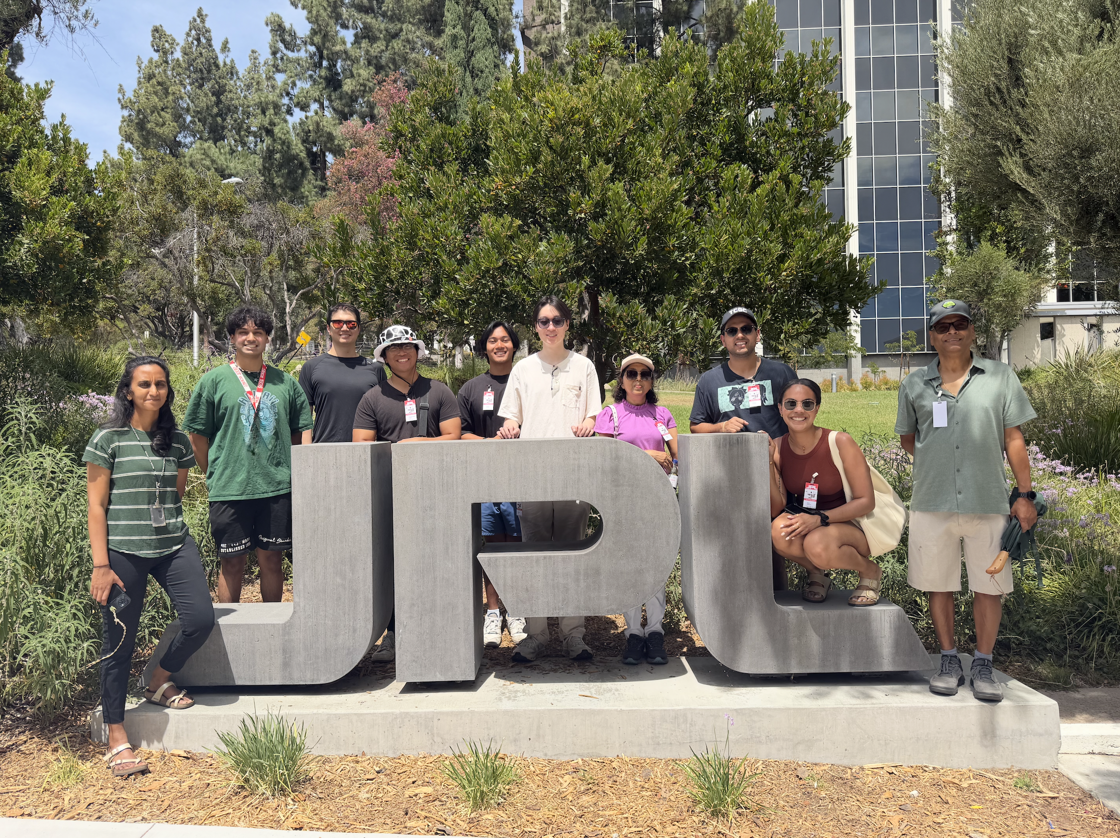 Group photo by the JPL sign.